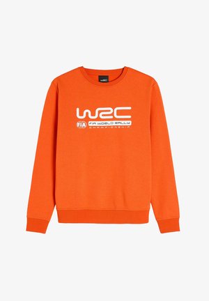 Pomarańczowa bluza z bawełny, z okrągłym dekoltem i ściągaczami na rękawach. Z przodu widnieje napis "WRC FIA World Rally Championship" w białym kolorze.