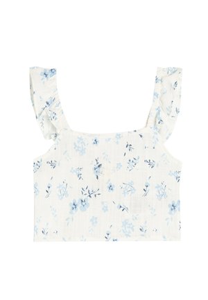 Blumiges Crop-Top mit hellblauen und dunkelblauen Blumenmustern auf weißem Hintergrund, mit Rüschenträgern und einem quadratischen Ausschnitt.