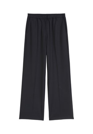 Pantalons noirs à jambes larges en tissu lisse. Dotés d'une taille élastique et de poches latérales. Conçus avec une coupe décontractée.