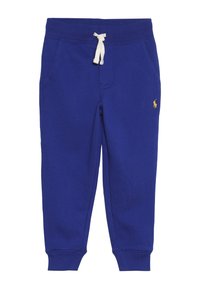 Pantalones de chándal de algodón azul con cinturilla elástica y cordón blanco. Cuenta con dos bolsillos laterales y un logo bordado en dorado en el muslo izquierdo.