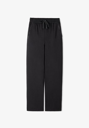 Schwarze, lässig geschnittene Hose aus weichem Stoff, mit einem elastischen Bund und Kordelzug sowie seitlichen Taschen für Stauraum.