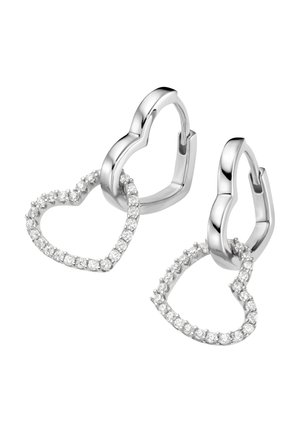 Pair of silver hoop earrings, each featuring a dangling open heart charm encrusted with small, clear gemstones, on a white background.