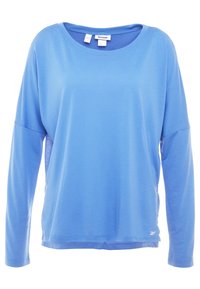 Ljusblå långärmad skjorta med rund halsringning, avslappnad passform och sidopaneler i mesh. Tillverkad av mjukt tyg med en slät textur.