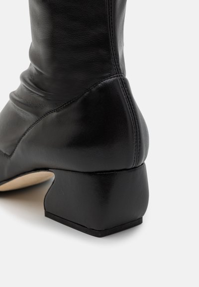 SI ROSSI Cuissardes - black