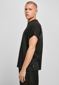 Urban Classics T-shirt print - schwarz