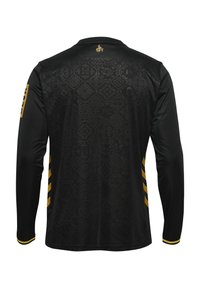 Schwarzer Langarm-Jersey mit einem strukturierten geometrischen Muster, gelben Akzenten an den Ärmeln und einem abgerundeten Kragen.