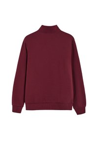 Bordeaux sweatshirt met een hoge kraag, lange mouwen en geribbelde boorden en zoom. Gemaakt van zachte stof met een gladde textuur.