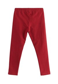 Røde leggings med elastisk linning, lavet af blødt stof. Glat tekstur, fuldlængde design, uden synlige syninger eller mønstre.