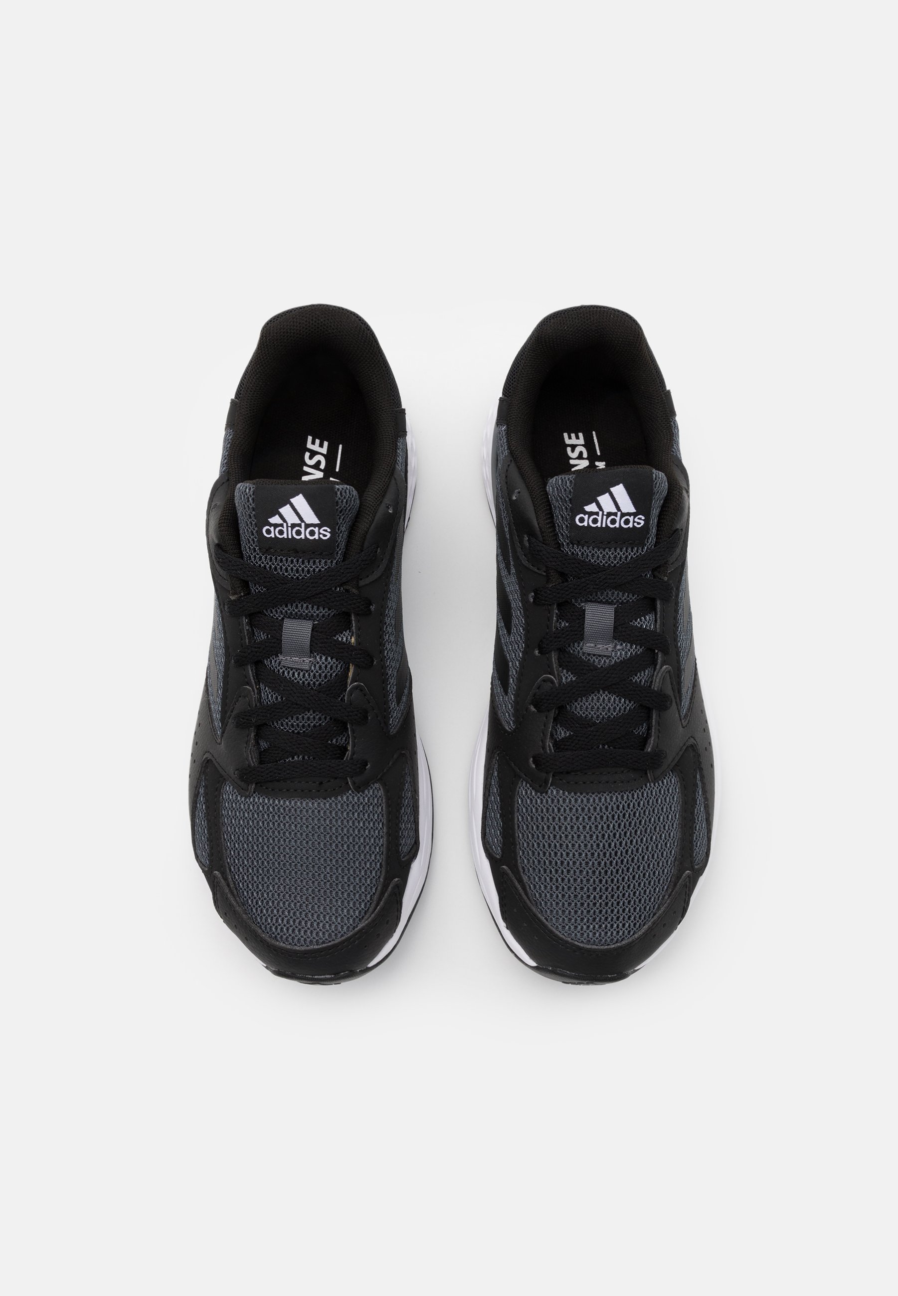 adidas running response run trainers in black and white