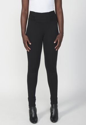 Leggings - Byxor - black