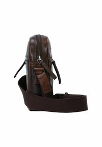 Brown leather bag with a zip closure, adjustable fabric strap, and subtle stitching details. Compact design, rectangular shape.