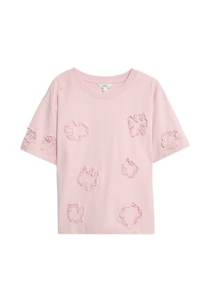 T-shirt en coton rose à coupe décontractée, avec des appliqués floraux texturés de différentes tailles sur tout le tissu. Manches courtes.