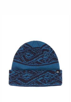 Blue knit beanie with dark blue geometric patterns and a folded brim featuring a small black and white logo tag.