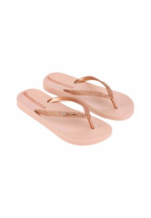 Chanclas rosas con una base texturizada, tiras brillantes en oro rosa con acentos de brillantina y una suela plana.