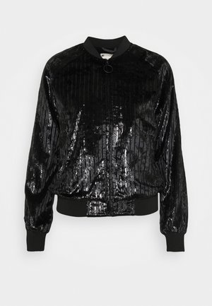 Black shiny bomber jacket with vertical textured stripes, ribbed collar, cuffs, waistband, and front zipper with circular pull tab.