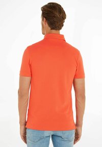 Tommy Hilfiger SLIM POLO - Polo - rost