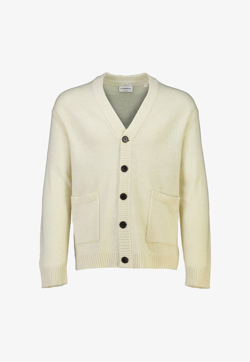 Elfenbensfärgad stickad cardigan med V-hals, ribbade ärmmuddar och två framfickor. Har fem svarta knappar framtill. Mjuk textur.