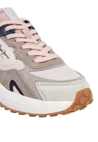 Light gray and pink sneaker, featuring suede and fabric materials, round toe, textured rubber sole, and contrasting black accents.