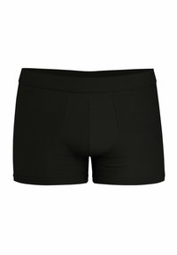 Boxer shorts noirs en tissu doux, avec une taille élastique ajustée, des jambes droites et un design de poche à l'avant.