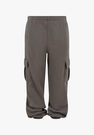 Szare spodnie cargo wykonane z miękkiej bawełny, charakteryzujące się luźnym krojem, elastycznym paskiem w talii oraz bocznymi kieszeniami cargo dla dodatkowej funkcjonalności.