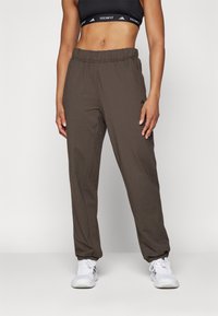 adidas Performance POWER LOOSE FIT - Treniņtērpa apakšdaļas - shadow olive