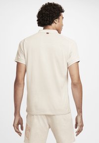 Nike Performance NIKECOURT HERITAGE - Polokošeľa - lt orewood brn