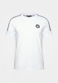 Witte T-shirt met korte mouwen en zwart Michael Kors-logo op de borst, met merkstripes langs de schoudernaad.