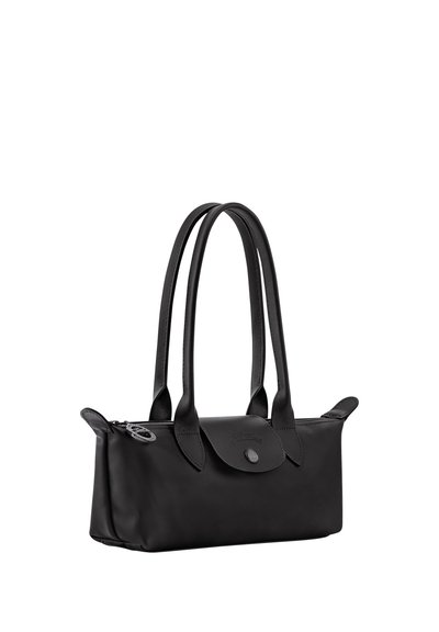 Black rectangular handbag with double handles, a flap with button closure, and a zippered top.