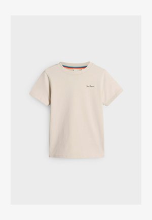 Beige bavlněné tričko s krátkými rukávy, s kulatým výstřihem a malým černým logem vyšitým na prsou. Jednoduchý, neformální design.