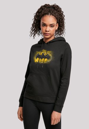 Black hoodie featuring a prominent yellow and black Batman logo, made of soft fabric with a kangaroo pocket and drawstring hood.