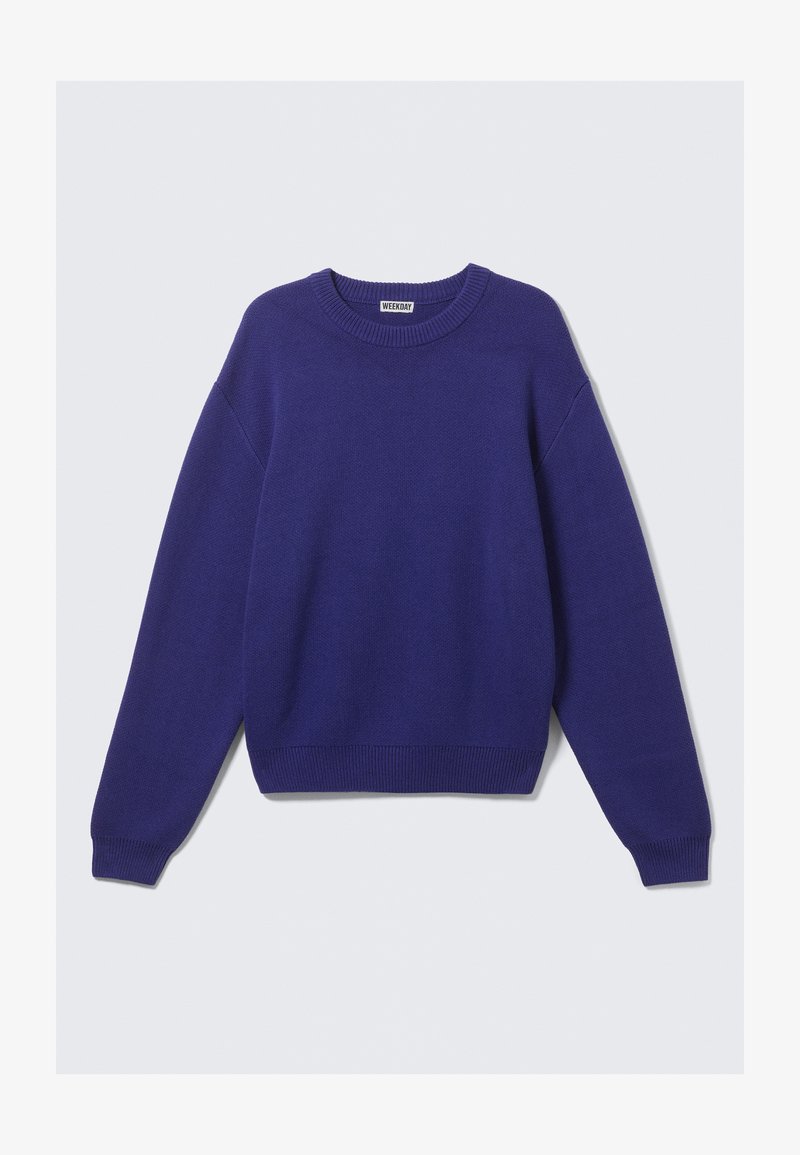 Jersey de punto de manga larga en azul oscuro con puños y dobladillo acanalados, y cuello redondo, etiquetado Weekday en el interior del cuello.