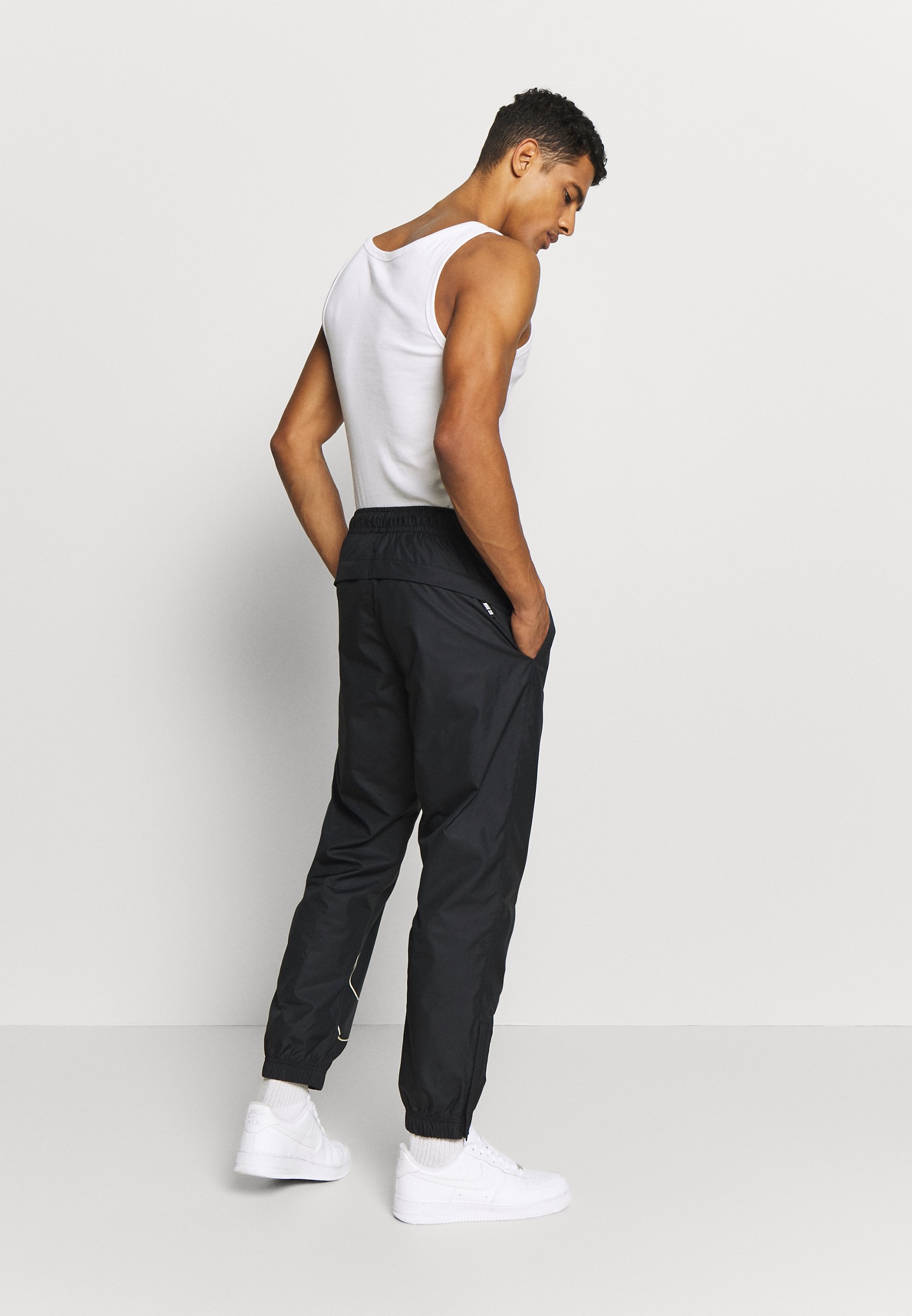 nike fossil & black track pants