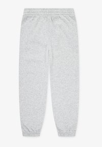 Lys grå joggebukser laget av myk stoff, med elastisk midjebånd og smale mansjetter ved anklene for en tett passform.