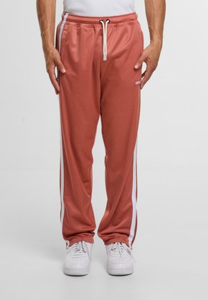 DMWU EVOLUTION - Pantalon de survêtement - rust