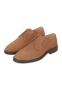 Braune Wildleder-Halbschuhe mit glatter Textur, runder Zehenpartie, Schnürdesign und einer dunklen Gummisohle. Verfügt über ein dezentes Logosymbol.