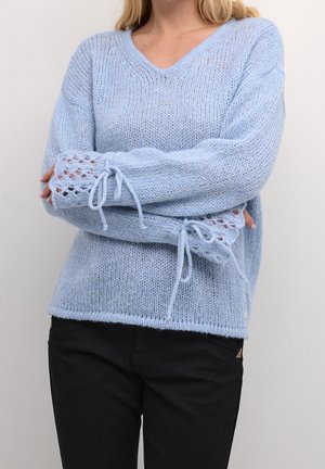 Stickad tröja - light blue