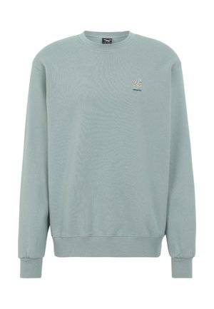 Hellblaues Sweatshirt mit Rundhalsausschnitt, langen Ärmeln und einem kleinen gestickten Liegestuhl-Logo auf der linken Brust.