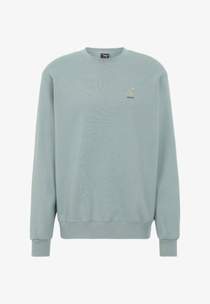 Light blue crewneck sweatshirt with long sleeves and a small embroidered deck chair logo on the left chest.