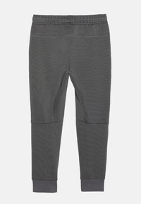 Nike Sportswear TECH PANT WINTERIZED - Verryttelyhousut - smoke grey/black