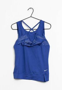 Blå idrottstopp i tanktop-stil med volangdesign, prydd med små strassstenar och korsade axelband. Nike-logotypen sitter längst ner.