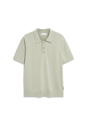 Lichtgroen poloshirt met korte mouwen van zachte stof, met een klassieke kraag, drie knopen en een rechte zoom. Inclusief een merketiket.