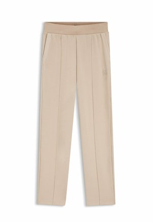Pantalones beige de tela suave, con una amplia cintura elástica, dos bolsillos laterales y pliegues sutiles en la parte delantera.
