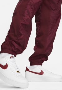 Nike Sportswear Pantaloni sportivi - dark beetroot coconut milk