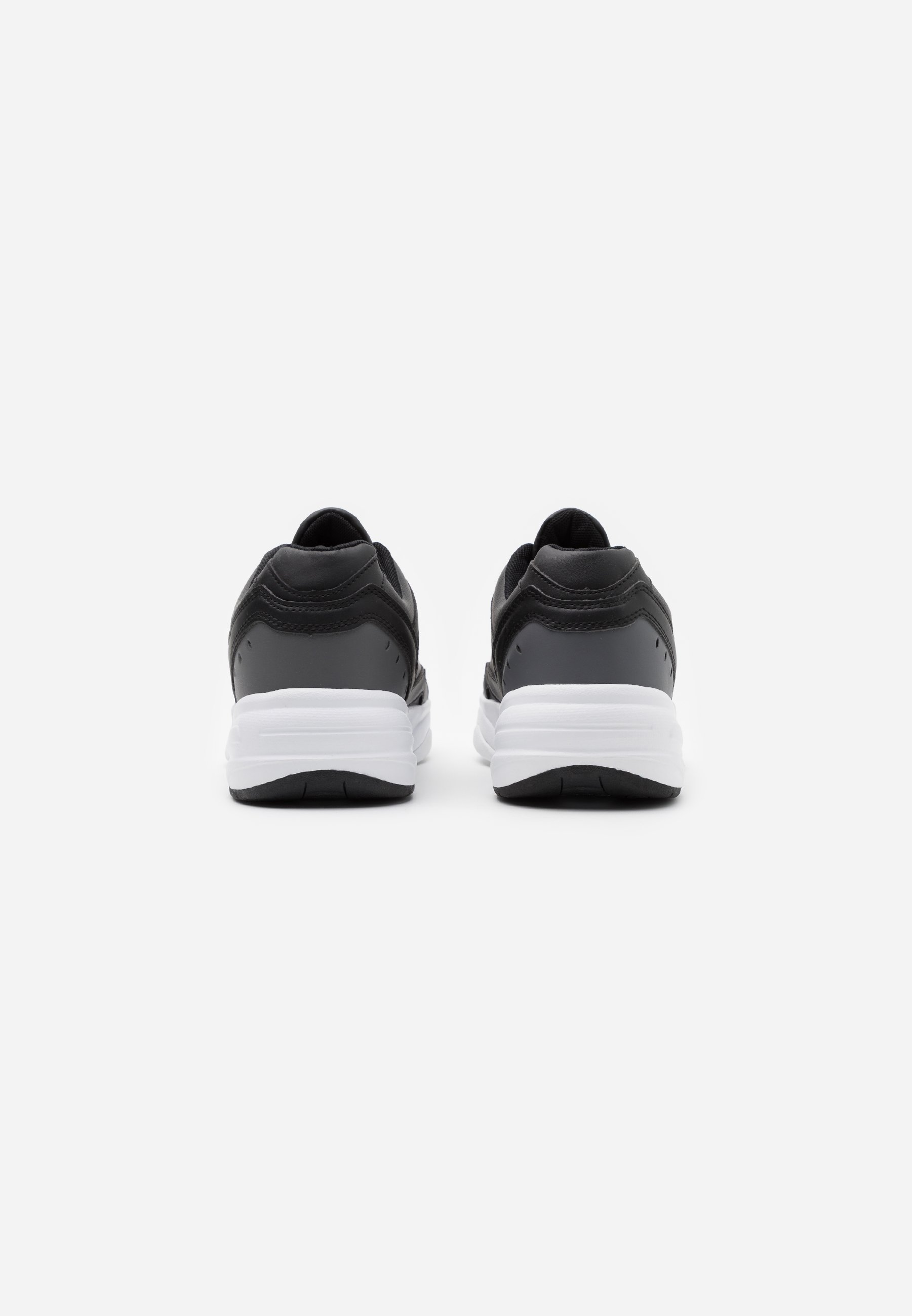 white and black champion shoes