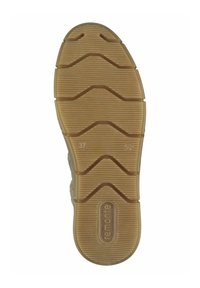 Suela de zapato de goma, marrón claro con estrías y patrones texturizados, marcada con la talla 37 y la marca "remonte."