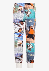 Pantaloni da jogging multicolore con un collage grafico di immagini e testi sul basket, con polsini bianchi. Realizzati in un tessuto morbido e flessibile.