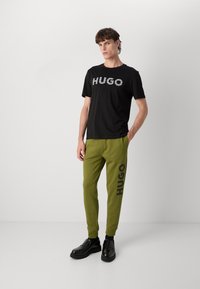 HUGO DUTSCHI - Joggebukse - open green