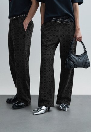 MOONOGRAM FLOCKED UNISEX - Pantalon de survêtement - black