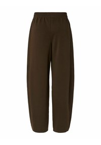 Pantalons de survêtement bruns avec taille élastique, coupe large et texture lisse avec coutures latérales. Conçus pour le confort et la mobilité.