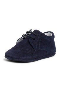Scarpe per bambini in suede blu navy con punta rotonda, design con lacci e dettagli perforati. Suola morbida per il comfort, tomaia testurizzata.